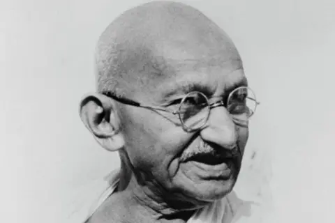 Getty Images Black and white archive photo of Indian independence leader Mahatma Gandhi.