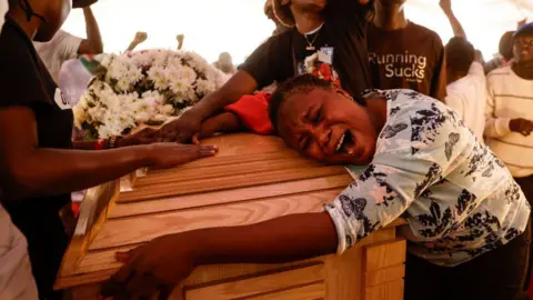 Getty Images Rex Masai's coffin