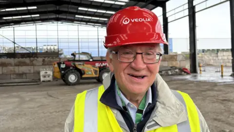 Councillor Darrell Pulk on building site