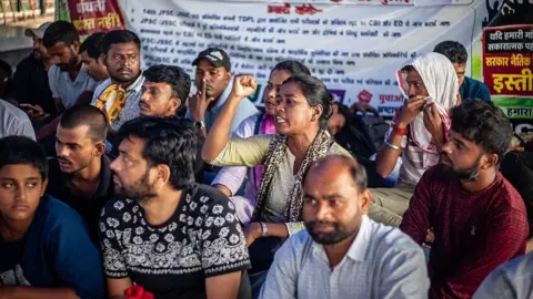 LightRocket via Getty Images Student protesters seen on stage during a demonstration. Job aspirants and student groups staged a demonstration against the Jharkhand Public Service Commission (JPSC).
