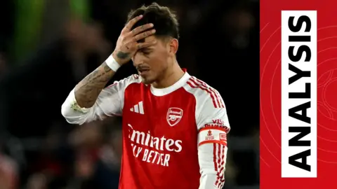 Ben White reacts with his hand on his head to Arsenal's loss against Southampton