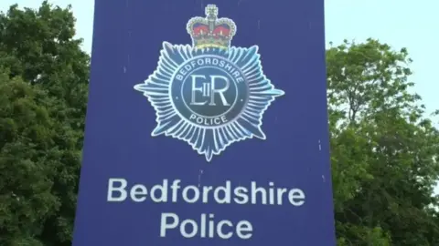 CONTRIBUTED Sign saying Bedfordshire Police. The background it blue with the police crest above the wording.