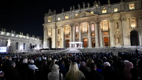 EPA Faithful attend a Rosary prayer for the health of Pope Francis who is hospitalized with pneumonia, in St. Peter's Square, Vatican City, 26 February 2025.