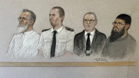  Julia Quenzler A courtroom sketch of Choudary and Mr Hussein, seated with two officers between them