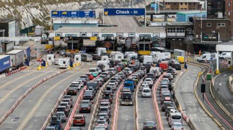 Queues of cars in several lanes approaching Check In at the Port of Dover