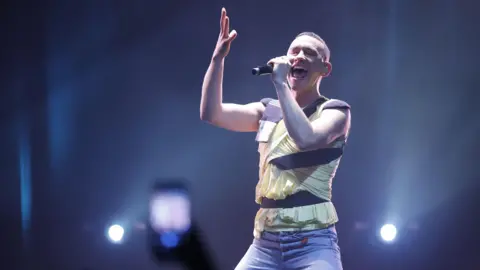 Olly Alexander performing