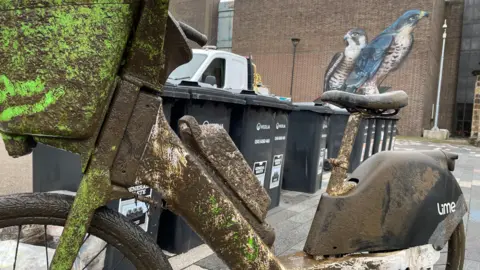 BBC A dirty Lime bike pulled from the River Derwent in Derby