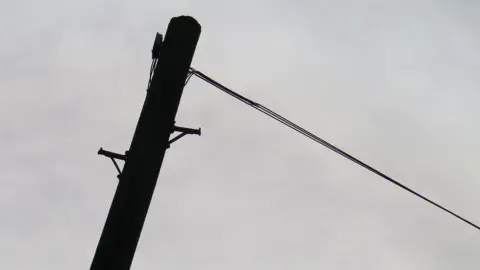 BBC A single telegraph pole with a cable attached to the top