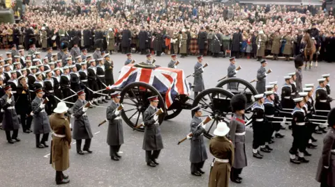 PA Media A close-up of the gun carriage carrying the coffin of Sir Winston Churchill crossing Trafalgar Square, London.