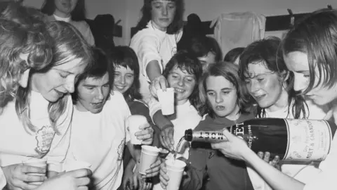 Getty Images The England team comprised Susan Buckett, Margaret Miks, Morag Kirkland, Wendy Owen, Sheila Parker, Janet Bagguley, Sandra Choat, Pat Firth, Pat Davies, Sue Lopez, and Jeannie Allott, with substitutes Liz Deighan, Carol McCune, Lorraine Dobb, Annette Matthews.
