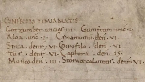 Corpus Christi College, Cambridge A sepia coloured 9th Century manuscript with faded brown writing showing a recipe for incense in Latin, listing the ingredients and their quantities 