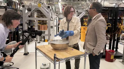 BBC economics editor Faisal Islam being shown around a Google facility in Santa Barbara