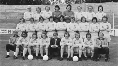 Getty Images A black and white official photo of the old Oxford United team arranged in three rows