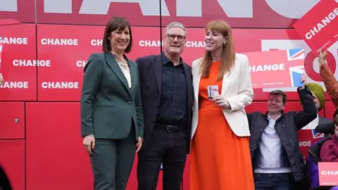 PA Media Left to right: Reeves, Starmer and Rayner during the election campaign