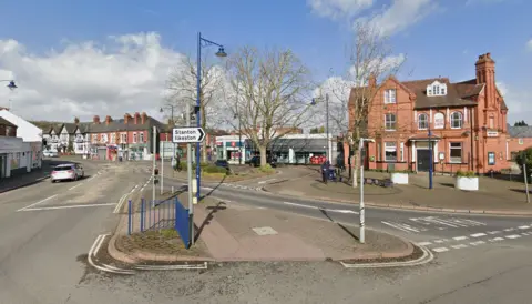 Google Google Streetview image of Sandiacre town centre with a pub visible next to a supermarket