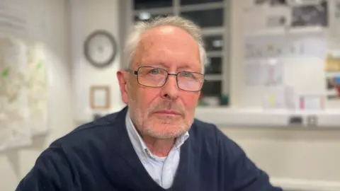 Peter Soulsby is pictured. He is a bearded man wearing glasses. 