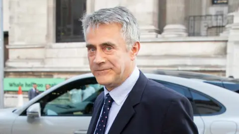 George Cracknell Wright/LNP Christopher Harborne arrives at the Victoria and Albert Museum during the Conservative Party Summer Party in 2022. He is a middle aged man with short grey hair in a suit and tie