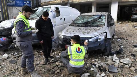 Vehicles damaged by a suspected drone strike in Beirut (file photo)