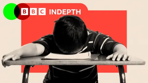 Against a red and beige backdrop, a boy slumps forward with his face and arms on his school desk. The BBC InDepth logo is in the top left-hand corner.
