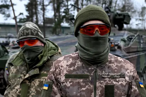 EPA Ukrainian soldiers being trained on a Marder tank in Munster, Germany, on 20 February 2023