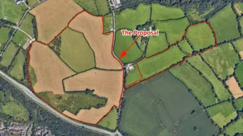 Cornwall Council/Google Earth An aerial photo showing the six fields where the solar farm will be developed outlined in red with the words: The proposal and an arrow in red.