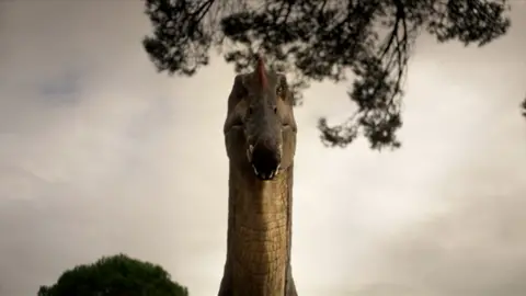The head of a Spinosaurus dinosaur face-on