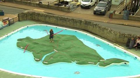 Emily Hudson on Isle of Wight shaped paddling pool