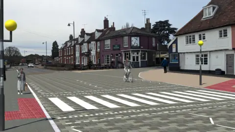 Suffolk County Council A CGI image of what Station Road in Woodbridge could look live following the active travel plan. An improved pedestrian crossing has been drawn up as well as widened pavements.