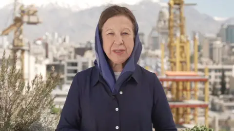 BBC chief international correspondent, Lyse Doucet, wearing navy outfit