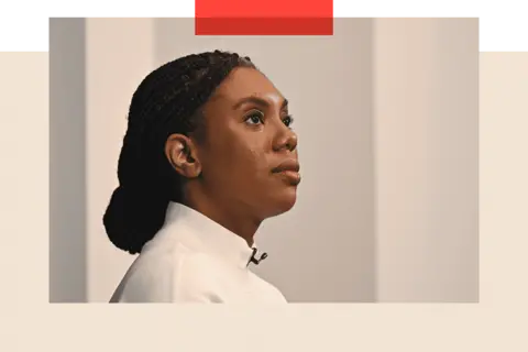 Getty Images Kemi Badenoch speaks during an announcement of the party's policy renewal programme on 18 March 2025 in London.