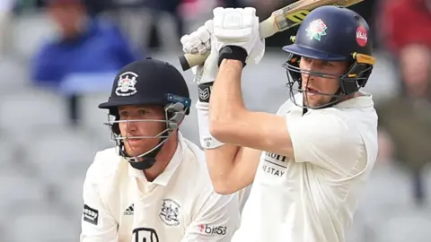 Tom Hartley batting