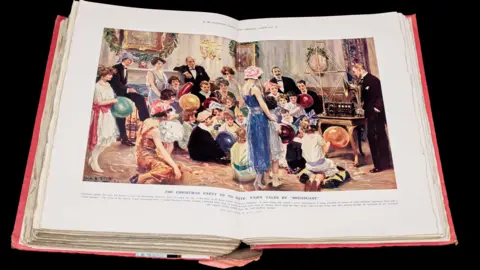 Illustrated London News; Bodleian Libary A vivid colour drawing of a crowd of people wearing formal wear at Christmas gathered round an early radio receiver 