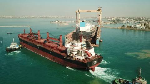 A cargo ship being repaired after being attacked in the Red Sea