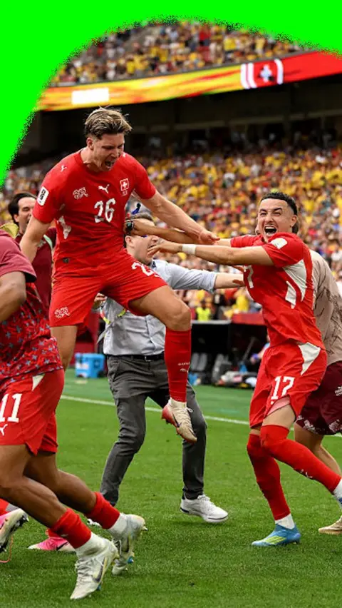 Switzerland players jump around to celebrate progressing to the quarter-finals of the 2026 World Cup