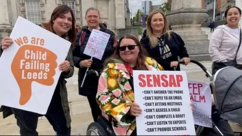 Gemma Dillon/BBC Parents staged a protest to raise awareness of a lack of special educational needs places at schools