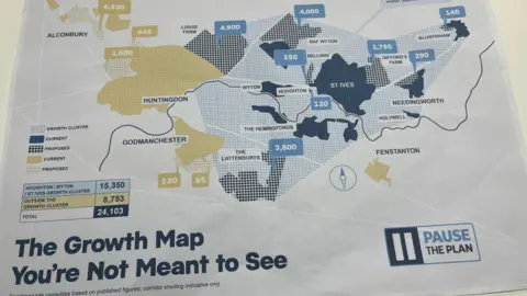 Paper depicting the area of possible housing developments around Huntingdon and St Ives. It says 'The Growth Map You're Not Meant to See' and 'Pause the Plan'.