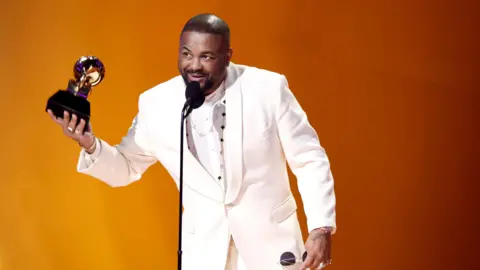 Terius "The-Dream" Gesteelde-Diamant accepts the Best R&B Song award for “Cuff It” onstage during the 65th GRAMMY Awards