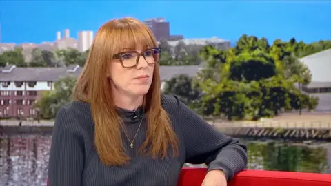 Angela Rayner wearing glasses sitting on the Breakfast sofa