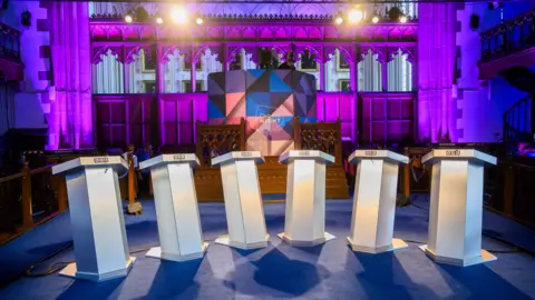 BBC The empty podium at the BBC debate