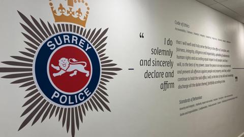 Surrey Police's ethics print on a wall at its Mount Browne HQ