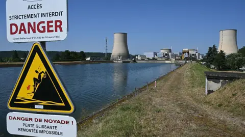 AFP via Getty Images A view of the stopped Golfech nuclear power plant in southwestern France after its shutdown on June 22 evening, due to "environmental constraints" 