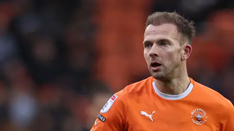 Jordan Rhodes in action for Blackpool