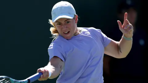 Great Britain's Sonay Kartal hits a forehand in her match against Emma Navarro at Indian Wells. 