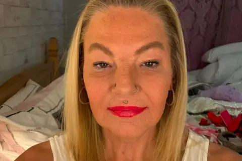 Supplied A picture of a blond woman looking directly at the camera