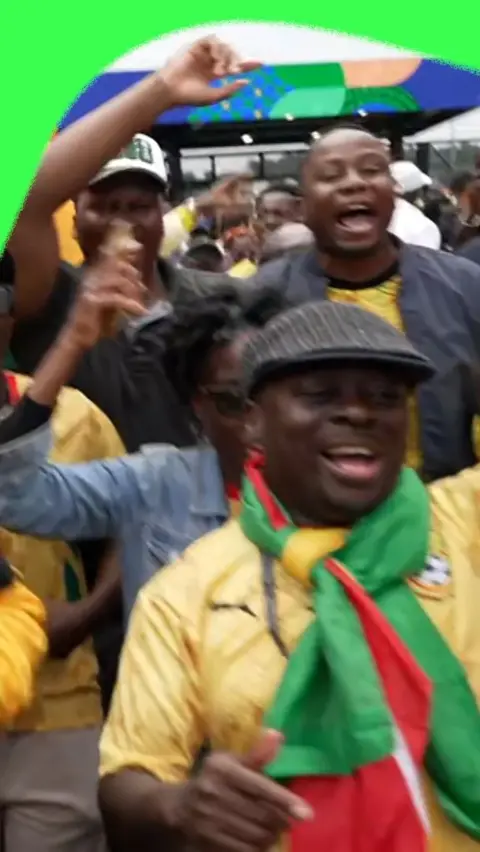 Ghana fans celebrate after their draw with England
