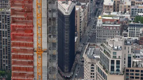 Getty Images Aerial view of the building covered in dark material
