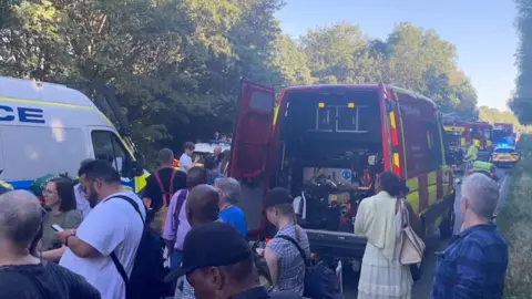 People standing near the train