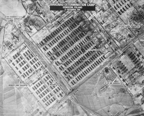 US States Holocaust Memorial Museum A black and white aerial view of Birkenau shows the sprawling camp at Birkenau and how some parts of the camp had already been destroyed as the Nazis prepared to flee. The picture is from the US States Holocaust Memorial Museum, courtesy of the National Archives and Records Administration