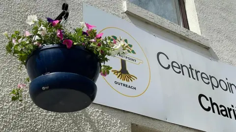 Boston Borough Council Hanging basket outside shop