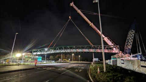 Bridge being craned into position